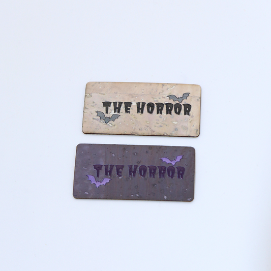 "The Horror" Set of 2 - Cork Tag